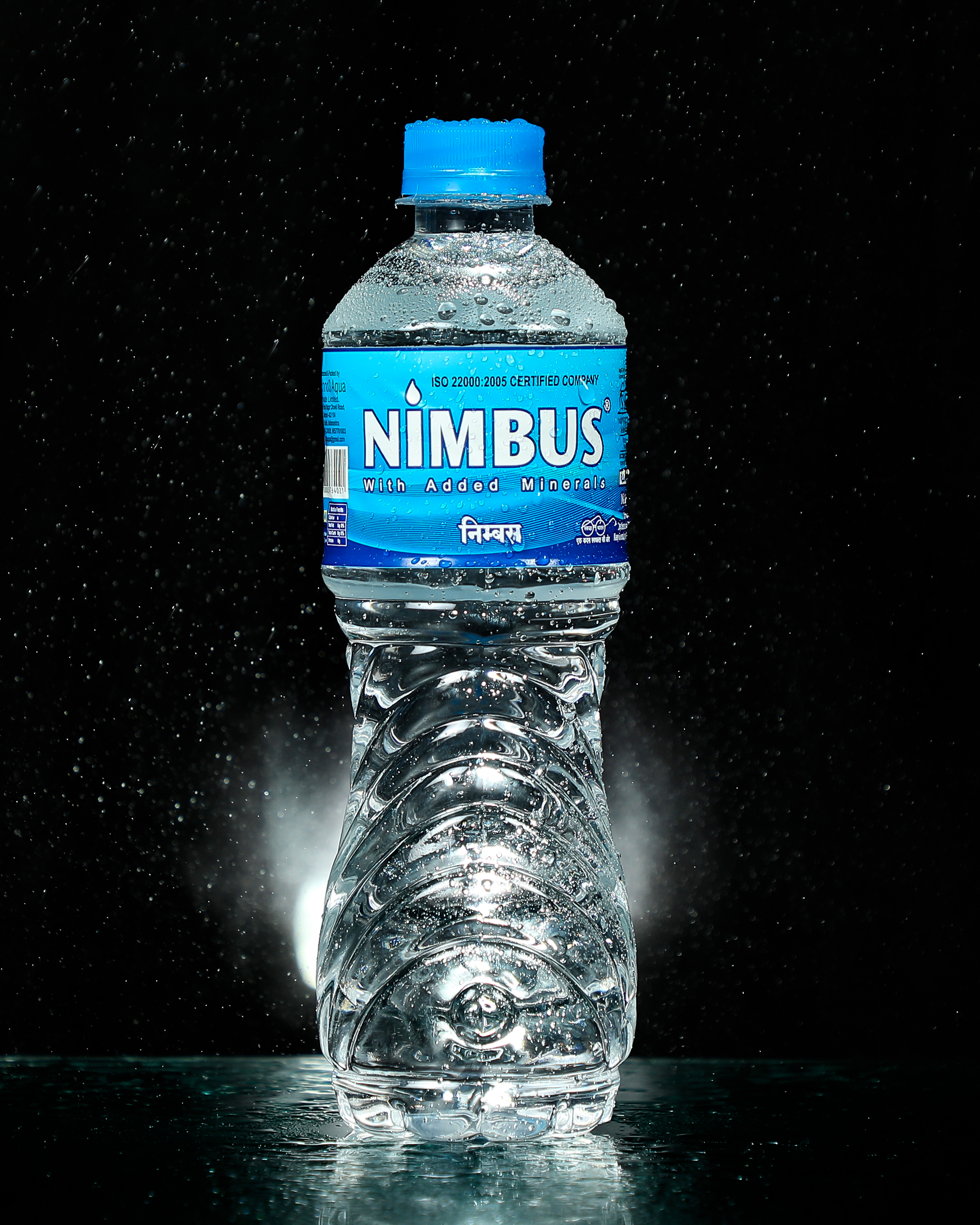 Nimbus bottles photographed with water droplets